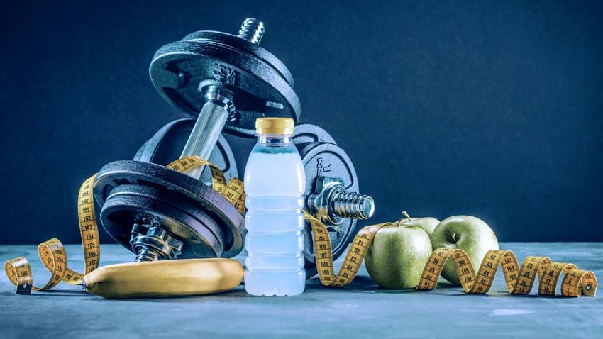 Pessoa saudável se exercitando ao ar livre, promovendo hábitos saudáveis para emagrecer.